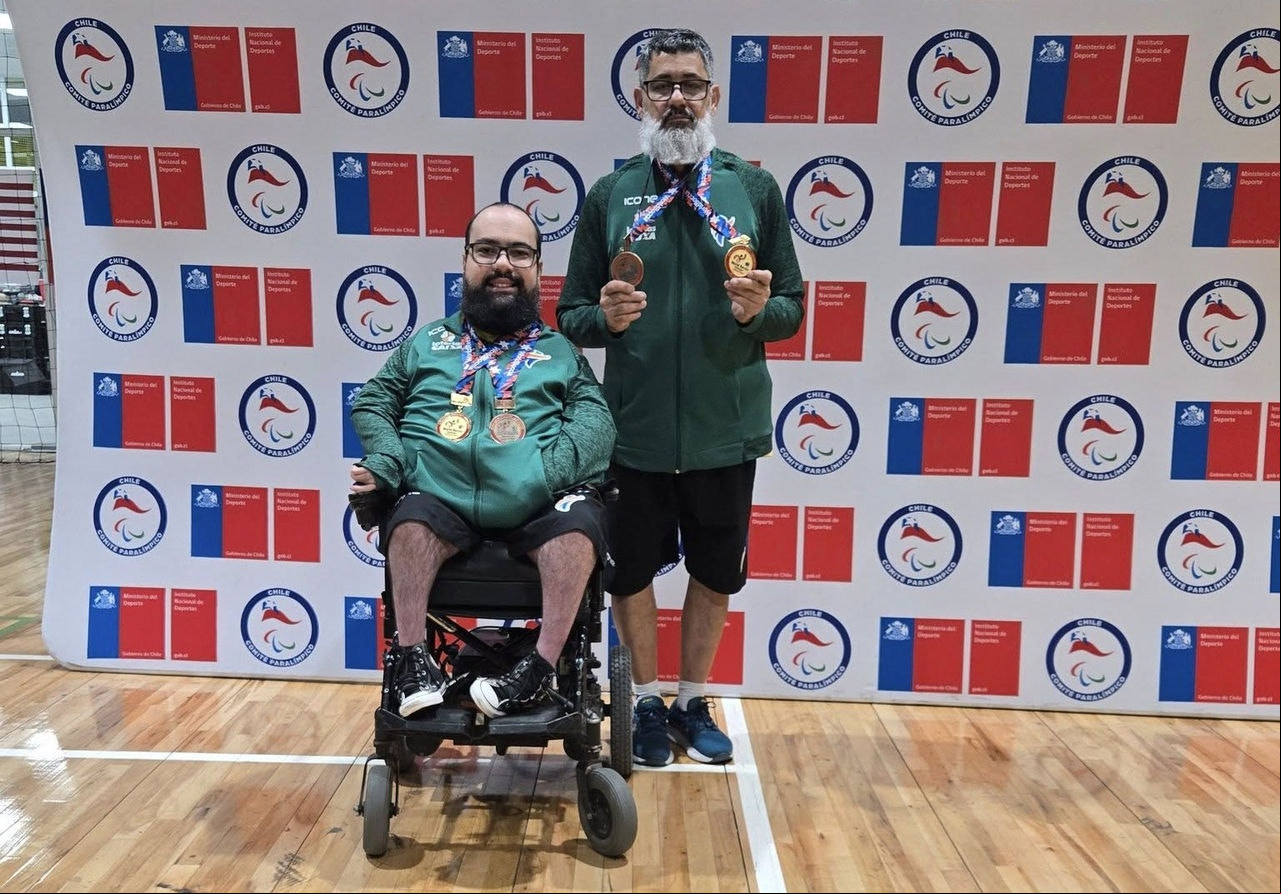 Paratleta Mateus Carvalho e o assistente esportivo Oscar Carvalho